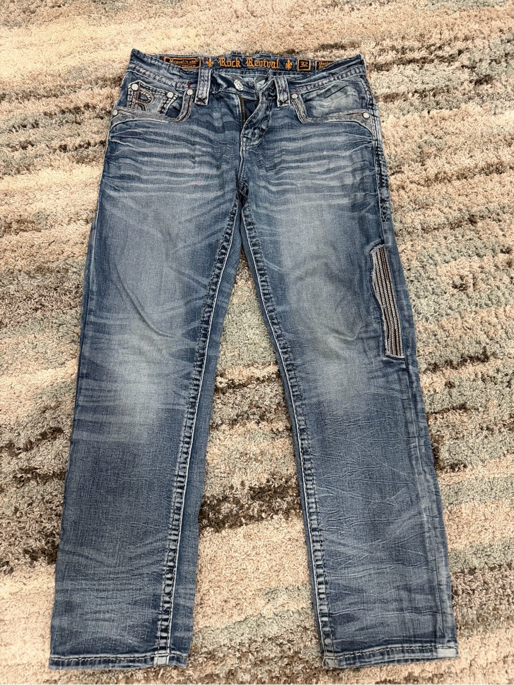 Rock Revival Men’s Faded Blue Straight Jeans with Patch Detail